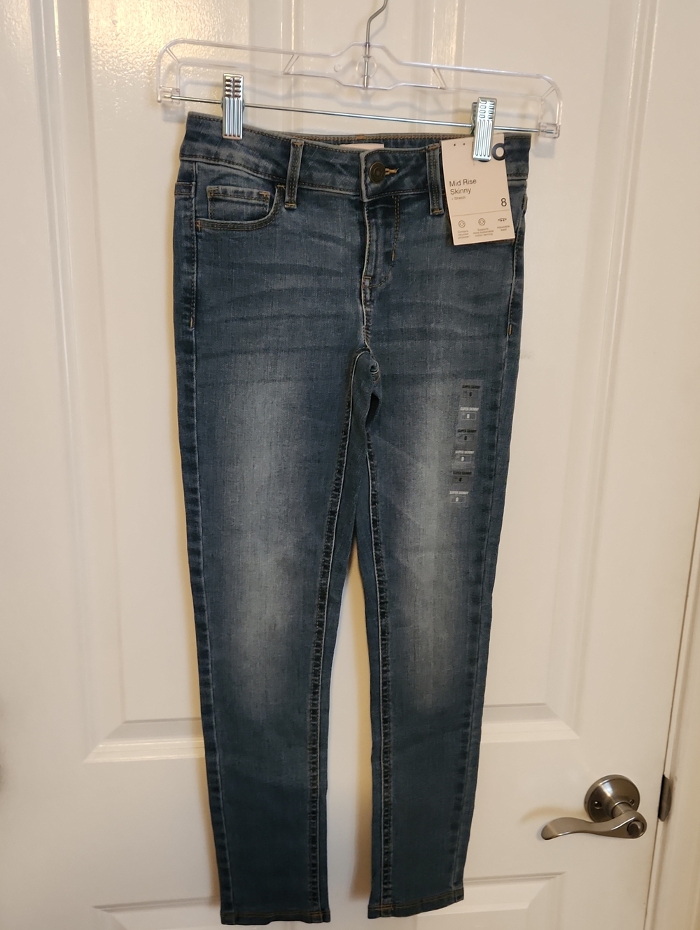 SO Mid-Rise Skinny Jeans in Washed Blue